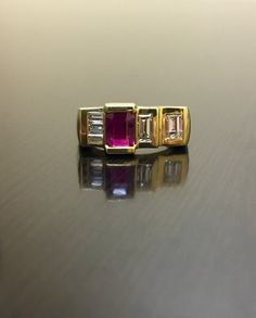 18K Yellow Gold Art Deco Diamond Ruby Engagement Ring - 18K Gold Art Deco Emerald Cut Ruby Diamond Wedding Ring - Diamond Art Deco Ruby Ring by DeKaraDesigns on Etsy https://www.etsy.com/listing/398451483/18k-yellow-gold-art-deco-diamond-ruby Designer 14k Gold Wedding Rings, Designer Yellow Gold Wedding Rings, Designer Multi-stone Rings For Formal Occasions, Gold Baguette Cut Ruby Diamond Ring, Gold Emerald-cut Ruby Ring For Wedding, Gold Ruby Baguette Cut Diamond Ring, Gold Emerald Cut Ruby Ring For Wedding, Designer Hallmarked Diamond Ring For Wedding, Gold Ruby Baguette Cut Rings