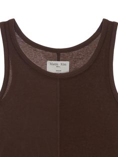 This is a casual and feminine top by Matin Kim that is made out of high quality and sturdy material. With distinctive mood of the design and comfortable wear, you can style it for your casual summer outfit.- Minimal metal embellishment detail- Basic and simple mood- Light fabric for summer season Brown Cotton Summer Tank Top, Brown Cotton Tank Top For Summer, Summer Brown Cotton Tank Top, Sleeveless Brown Cotton Top, Chic Brown Cotton Tops, Brown Sleeveless Cotton Top, Fitted Brown Tank Top For Everyday, Brown Sleeveless Top For Spring, Sleeveless Brown Top For Spring