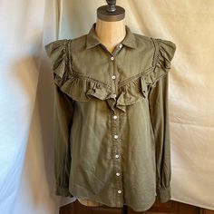 Nwt Anthropologie Size Xs Olive Green Long Sleeve Shirt Details Long Sleeve Button Down Shirt With Collar Ruffles At Shoulders And Front Of Shirt Fabric 100% Cotton Approximate Measurements Pit To Pit 17” Length Of Sleeve 18.5” Length 23.5” Khaki Tops With Button Closure For Day Out, Collared Khaki Tops For Day Out, Collared Cotton Blouse In Khaki, Chic Cotton Button-up Tops, Chic Khaki Tops With Buttons, Chic Cotton Tops With Buttons, Chic Cotton Tops With Button Closure, Chic Collared Khaki Top, Chic Cotton Shirt With Buttons