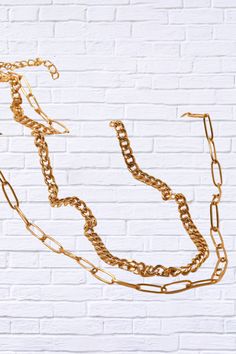 Step up your style game with our 18K Gold Plated Layered Chain Necklace, a statement piece that effortlessly combines elegance and trendiness. This layered necklace features multiple delicate chains, each plated in luxurious 18K gold, creating a stunning, layered look that adds depth and dimension to any outfit. Whether you’re dressing up for a night out or adding a touch of glam to your everyday attire, this versatile necklace is designed to make you shine. Key Features: 18K Gold Plating for a Gold Chain Multi-strand Layered Necklace, Gold Plated Tarnish-resistant Yellow Gold Chain Necklace, Luxury Gold-tone Polished Chain Necklace, Luxury 14k Gold Tarnish-resistant Chain Necklace, Luxury Gold-tone Tarnish Resistant Chain Necklace, Smart Casual Wear, Layered Chain Necklace, Versatile Jewelry, Layered Chains