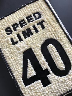 a cake with the number forty on it is decorated like a speed limit 40 sign