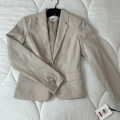 Brand New Calvin Klein Beige Blazer, Size 2p Classic Calvin Klein Blazer For Work, Fitted Calvin Klein Blazer For Work, Fitted Calvin Klein Office Blazer, Calvin Klein Single Breasted Spring Outerwear, Calvin Klein Single Breasted Outerwear For Spring, Calvin Klein Single-breasted Spring Outerwear, Calvin Klein Single-breasted Outerwear For Spring, Chic Calvin Klein Blazer For Office, Elegant Calvin Klein Blazer For Career