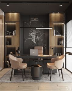 a modern office with black walls and wooden flooring, two chairs are facing the desk