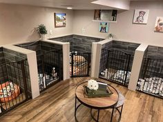 a room filled with lots of caged animals and flowers on top of a table