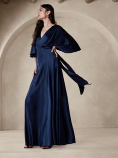 Crafted from customer favorite silk charmeuse, this stunning maxi dress employs a plunging tie back and a bias cut to enhance its drape.  Sheath fit.  V-neck.  V-back.  Invisible zip at wearer's left.  Batwing sleeves.  Unlined.  Sheath fit.  Sleeveless.  Maxi length.  Model: Size 2, 5'10" (178cm). Theme Dress, Silk Maxi, Silk Maxi Dress, Invisible Zip, Silk Charmeuse, Banana Republic Dress, Perfect Woman, Cocktail Dress Party, Tie Back