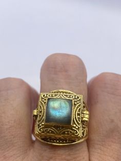 Vintage Labradorite Brass Poison Pillbox Ring Gold Moonstone Ring For Gift In Mystical Style, Unique Gold Moonstone Ring For Healing, Mystical Gold Moonstone Ring Gift, Gold Mystical Moonstone Ring Gift, Spiritual Gold Moonstone Ring As Gift, Gold Moonstone Ring For Spiritual Gift, Vintage Gold Moonstone Ring For Gift, Victorian Poison Ring, Vintage Labradorite Ring