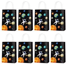 six small shopping bags with an astronaut on the moon and planets in front of them