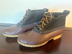 Up for sale is a pre-owned pair of vintage L.L Bean duck boots;  *Please see item specifics below. *Size-12M. Use dimensions provided as a guide Exterior dimensions; Outsole's length-13" Outsole's width-4.5" (ball of the sole) Heel's height-approximately 1" Insole length-12" Shaft-5.5" *Style-ankle boots This is a pre-owned pair in superb condition and sold as is. No foul odors, comes from a pet/smoke free home. Please see all pictures for a better visual description and do not hesitate to contact us via Etsy if you have any questions. Thanks. Ll Bean Duck Boots, Vintage Ll Bean, Duck Boots, Ll Bean, L L Bean, Vintage Black, Shoes Mens, Men's Shoes, Heel Height