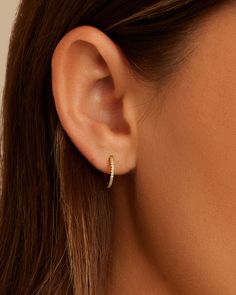 Dainty huggies lined with gleaming cubic zirconia make for the perfect earring to wear all day. Dainty huggies lined with gleaming cubic zirconia make for the perfect earring to wear all day. Ear Layering, Gorjana Earrings, Piercings Earrings, Gorjana Jewelry, Small Gold Hoop Earrings, Black Labradorite, Small Gold Hoops, Orange Agate, Outfit Jewelry