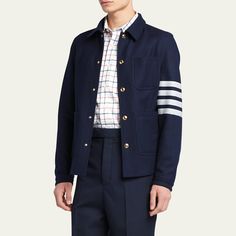 Thom Browne twill chore jacket with branded gold-tone buttons Spread collar Four front utility patch pockets Signature 4-Bar detail on left sleeve Long sleeves with buttoned cuffs Wool Dry clean Made in Italy Bar Detail, Chore Jacket, Thom Browne, Tops Designs, In Italy, Dry Clean, Long Sleeves, Italy, Luxury Fashion