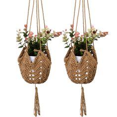 two hanging planters with flowers in them