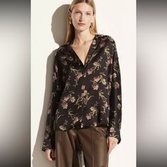 Elevate Your Wardrobe With This Stunning Vince Iris Honeysuckle Shaped Collar Pullover Shirt Blouse. The Floral Pattern, Long Sleeves, And V-Neckline Make It A Versatile Piece For Both Casual And Workwear Occasions. The Lightweight And Satin Fabric Type Ensure That It's Comfortable To Wear All Year Round. This Relaxed Fit Tunic Blouse Is A Must-Have For Any Fashion-Forward Woman. The Oversized Design And Black Color Add A Touch Of Designer Flair To Your Outfit. Garment Care Is Dry Clean Only. Th Long Sleeve Silk Tops For Fall, Elegant Floral Print Blouse With Relaxed Fit, Casual Silk Top With Floral Print, Casual Silk Tops With Floral Print, Casual Silk Blouse For Fall, Long Sleeve Silk Tops For Spring, Feminine Long Sleeve Silk Top, Silk Long Sleeve Top For Spring, Fall Silk Tops For Daywear