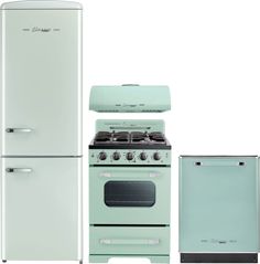 a white refrigerator freezer sitting next to a stove top oven