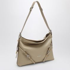 Imagine a bag that’s as chic as it is versatile, one that's perfect for spicing up any outfit. This charming piece is crafted with love and a dash of elegance right from Italy. You'll find that it’s your new go-to accessory for every occasion. Light beige calf leather with a subtle logo stamp at the front Elegant logo-buckle detail with silver-tone hardware Convenient open top with adjustable shoulder strap for comfort Spacious main compartment with an internal zip-fastening pocket for essential Metal Lettering, Rings Metal, Lettering Logo, Leather Cap, Beach Tote Bags, Shoulder Handbag, Medium Bags, Leather Jewelry, Metal Buckles