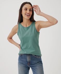 Women’s Softspun High Neck Tank made with Organic Cotton | Pact Organic Cotton Tank Top For Spring, Stretch Soft-washed Tops, Casual Organic Cotton Tank Top For Spring, Comfortable Stretch Tops, Spring Organic Cotton Tops, Comfortable Organic Cotton Tops For Everyday, Comfortable Organic Cotton Tops, Green Relaxed Fit Tank Top For Everyday, Summer Organic Cotton Tank Top