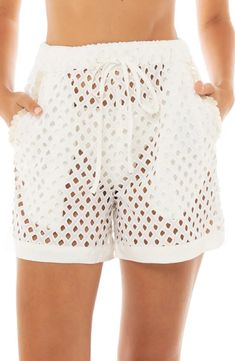 Agua Bendita Watts Kai Paillette Sheer Linen Blend Eyelet Cover-Up Shorts | Nordstrom Beachy Shorts For Summer Beach Cover-up, Chic Shorts For Summer Beach Outings, Chic Shorts For Summer Outings And Beach Season, White Shorts For Summer Vacation, Chic Shorts For Summer Outings, White Vacation Bottoms With Pockets, Spring And Summer Drawstring Shorts, White Bottoms With Pockets For Vacation, White Shorts For Vacation Day Out