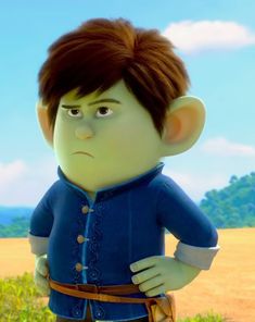 an animated character with brown hair and blue shirt standing in front of a grassy field