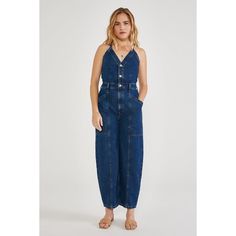 Contrast seaming and oversized pockets add to the utilitarian vibe of this relaxed denim one-piece. 27" Inseam, 16.5" Leg Opening 77% Cotton, 23% Refibra Tencel Imported American Made Clothing, Utility Jumpsuit, Net Zero, Long Jumpsuits, Floral Jumpsuit, Printed Jumpsuit, Sleeveless Jumpsuits, Denim Jumpsuit, Black Ruffle