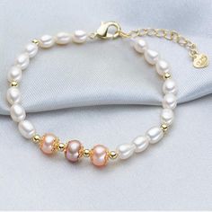 This beautiful Freshwater pearl bracelet ranges between 7-8mm in size and consists of beautiful and lustrous pearls in AAAA+ quality. All pearls in this bracelet are round and are strung with silk thread and double-knotted between each pearl. Known as the 'icon' of cultured pearls, Freshwater pearls have graced the necks, ears, fingers, and wrists of women for decades. Huge Tomato imports their Freshwater pearls from the Freshwater rs of Japan, grown in the Pinctada fucata oyster. All of our Fre