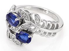 1.12ct Oval Blue Kyanite With .12ctw Round White Zircon Rhodium Over Sterling Silver Ring. Measures Approximately 0.62"L x 0.86"W. Not sizeable.    Accent stones primarily zircon. Sapphire Kyanite Jewelry As A Gift, Silver Kyanite Jewelry As Gift, Blue Kyanite Necklace For Gift, Blue Kyanite Gemstone Beads Jewelry, Luxury Blue Kyanite Jewelry, Zircon Jewelry, Blue Kyanite, Blue Zircon, Sterling Silver Ring