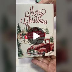 someone is holding up a christmas card from the book merry christmas by deegeen graham