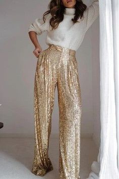 Experience luxury, glamour and elegance in these dazzling structured sequined pants. Featuring a wide leg cut with full lining for a comfortable fit, they’re perfect for holiday, New Year's Eve and other special occasions. Enjoy the sophisticated shimmer of imported sequins! About this product: -This product is very true to size because it does not have any stretch. -The lining is shorts -Model wearing red blazer is wearing her true to size Large in the pants and she is 5'9. -Model wearing the b Elegant Sequin Pants, Luxury Designer Pants For Festive Occasions, Luxury Elegant Wide Leg Pants For Parties, Luxury Party Wide Leg Pants For Women, Luxury Elastane Wide Leg Party Pants, Luxury Wide Leg Pants For Party Season, Luxury Wide Leg Bottoms For Party Season, Luxury Festive Pants For Night Out, Luxury Glamorous Wide Leg Pants For Party