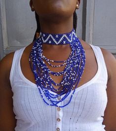 Blue and White Necklace, African Beaded Necklace, African Jewelry, Necklace for Women, Tribal Necklace, Gift For herThis beaded necklace is superbly crafted which can be worn with any outfit at different occasions.Main color - Blue and white.The necklace can be available in different colors.Wholesale available at a fair price,please contact me.For any clarification,please send me a convo or an e-mail.Thank you for visiting and happy shopping!!.. Blue Multi-strand Jewelry With Dangling Beads, Elegant Blue Choker With Colorful Beads, Elegant Blue Beaded Choker, Adjustable Blue Necklace With Dangling Beads, Blue Necklace With Dangling Beads, Blue Jewelry With Dangling Round Beads, Blue Multi-strand Beaded Jewelry, Blue Beaded Multi-strand Jewelry, Blue Beaded Chain Choker