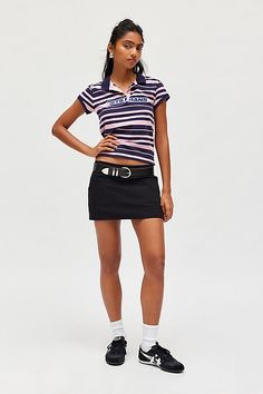 Cargo styling made modern UO mini skirt in a slim, tailored fit. Designed in a soft, stretch woven featuring a low-rise waistline, utility-inspired patch pockets and a side-split hem. Finished with hidden shorts underneath! Only at Urban Outfitters. Features UO Dariah cargo pocket mini skort Low rise mini skort Soft stretch woven fabric Low rise waistline that sits at the hips Patch pocket details at the front Split-sides hem Slim fit Mini length Shorts lining Zip closure UO exclusive Content + Cargo Styling, Cargo Pocket, Side Split, Split Hem, Black Fits, Pocket Detail, Patch Pocket, Woven Fabric, Low Rise