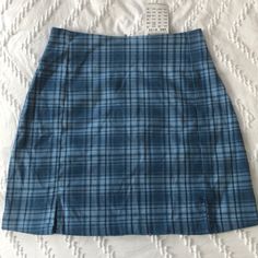 Nwt, Cute Blue Plaid Skirt. One Size From Brandy Melville. Two Small Slits At Bottom Front. Back Zipper. Comes From Smoke Free Home. Trendy Fitted Blue Skirt, Blue High Waist Cotton Mini Skirt, Blue High-waist Cotton Mini Skirt, High Waist Blue Cotton Mini Skirt, Trendy Blue Mini Skirt, Blue Pencil Skirt Lined Skort, Blue Pencil Skirt Skort For Summer, Blue Pencil Skort With Lined Skirt, Blue Lined Pencil Skirt Skort