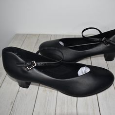 Capezio Women's Black Leather Sole Dancing Shoes -Size 11w (Wide) -Heel Measures Almost 2 Inches High -For Tap/ Ballroom Dancing -Leather Sole Balance -Materials Are Man Made -Made In Thailand -Rn# 63356 -Adjustable Strap -Brand New, In Perfect Condition, Box Not Included Almond Toe Synthetic Dance Shoes, Formal Synthetic Ankle Strap Dance Shoes, Formal Low Heel Synthetic Dance Shoes, Synthetic Closed Toe Court Shoes With Heel Strap, Formal Synthetic Dance Shoes With Almond Toe, Formal Synthetic Dance Shoes With Closed Toe, Formal Synthetic Closed Toe Dance Shoes, Formal Synthetic Closed-toe Dance Shoes, Black Round Toe Court Shoes Medium Width