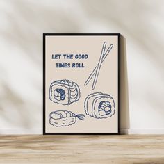 a poster with sushi and chopsticks that says let the good times roll