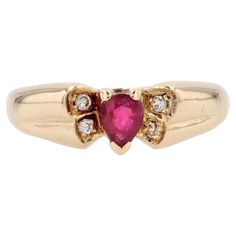 Ring in 18 karat yellow gold, owl hallmark. This charming yellow gold ring features a pear-cut ruby in the center, held in place with claws. On either side of the stone, the setting forms a double gadroon set at the ends with 2 x 2 diamonds in a closed setting. Height : 5,3 mm approximately, width : 9 mm approximately, thickness : 4 mm approximately, width of the ring at the base : 1.8 mm approximately. Total weight of the jewel : 2,6 g approximately. US Size : 5 ; Free resize, please contact us Yellow Gold Teardrop Ruby Ring For Anniversary, Pear-shaped Yellow Gold Ruby Ring, Gold Pear-shaped Ruby Ring, Gold Oval Ring, Gold Owl, Gold Waves, Ruby Diamond Rings, Modern Engagement Rings, Ruby Stone