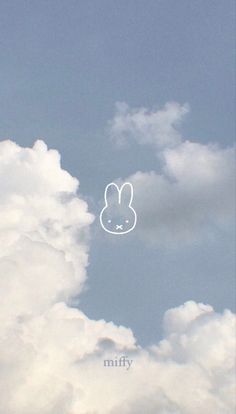 the sky is filled with clouds and there is a bunny drawn on it