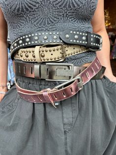 A classic accessory infused with heritage style, this leather belt from We The Free features rounded stud details for an eye-catching addition to any outfit. Features: Medium width, leather fabrication, rounded stud embellishments, adjustable buckle closure Why We <3 It: Perfect for cinching your waist and adding shape to any piece. Stacked Belts, Stud Outfits, Stud Belt, Girls Together, Jewelry Candles, Studded Belt, Shopping Event, Heritage Fashion, Cropped Denim Jacket