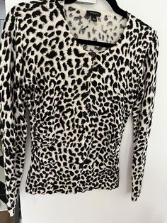 Animal prints are trending in 2025 and beyond say the fashionistas. This lightweight, SILK cardigan is 13" pit to pit, 18" long shoulder to hem, and 17" long sleeve pit to hem. Casual Leopard Print Long Sleeve Sweater, Casual Long Sleeve Leopard Print Sweater, Leopard Print Long Sleeve Sweater For Spring, Leopard Print Long Sleeve Sweater, Long Sleeve Leopard Print Sweater For Spring, Leopard Print Long Sleeve Cardigan For Fall, Long Sleeve Leopard Print Cardigan For Fall, Fall Printed V-neck Cardigan, Casual Patterned Long Sleeve Cardigan