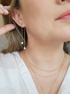 The sparkle on these double chain Pearl earrings could light up even the darkest room! Two natural Pearls swing on shimmery chain from each tiny stud. The earring post may be removed to wear on other stud earrings! ✨Details✨ * 3mm 14K Gold Filled or 925 Sterling Silver ball stud and accents * 2.75 inch length * 5mm genuine Pearls * 14/20 gf or 925 stamp for authenticity * Made with all hypoallergenic materials 🤍 * Sold as a pair Matching Necklace: https://etsy.me/42AkSCC ✨ Shop all Pearl earrin Delicate Dangle Linear Earrings, Delicate Dangle Linear Earrings With Chain, Everyday 14k Gold Filled Pearl Chain Earrings, Dainty Teardrop Earrings With Delicate Chain, Everyday Drop Earrings With Adjustable Chain, 14k Gold Dangle Pearl Earrings, Dainty White Earrings With Delicate Chain, Everyday Dainty Dangle Linear Earrings, Dainty Drop Earrings With Delicate Chain