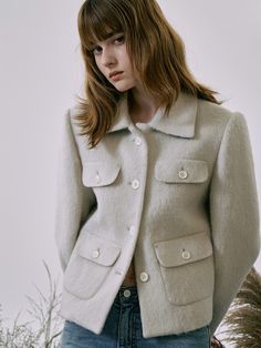 Editor's NotesThis product offers a cropped jacket design, emphasizing a streamlined and minimal silhouette. Multiple pockets are seamlessly integrated, serving both aesthetic and functional purposes. The structure of the jacket is further enhanced with built-in shoulder pads, ensuring a clean and defined shoulder line.- This cropped jacket stands out with its minimal silhouette, accentuated by strategically placed pockets.- Built-in shoulder pads are incorporated to provide a crisp and defined Fitted Cropped Jacket With Lapel Collar And Flap Pockets, Fitted Cropped Jacket With Flap Pockets And Long Sleeves, Fitted Cropped Jacket With Flap Pockets, Fitted Long Sleeve Cropped Jacket With Flap Pockets, Classic Cropped Jacket With Flap Pockets For Winter, Tailored Long Sleeve Cropped Jacket With Pockets, Classic Winter Cropped Jacket With Flap Pockets, Tailored Cropped Jacket With Lapel Collar And Pockets, Fitted Cropped Winter Jacket With Flap Pockets