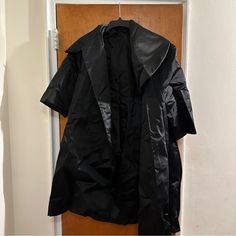 Vintage Black Satin Opera Coat. Unknown Size. 16 Inch 3/4 Length Sleeves. More Of A Heavier Weight Satin Used. Never Worn By Me But Did Get Wrinkled From Being In Storage, Could Use A Trip To The Dry Cleaners. No Other Flaws Detected Black 3/4 Sleeve Formal Outerwear, Black Formal Outerwear With 3/4 Sleeve, Opera Coat, Dry Cleaners, Black Satin, Vintage Black, Opera, Size 16, Length Sleeve