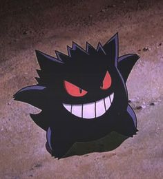 an evil looking cartoon character with red eyes