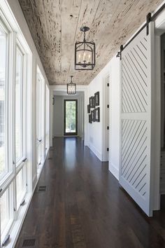 the instagram page on instagram shows an image of a hallway with white doors and wood