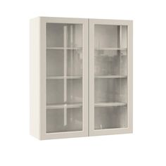 a white bookcase with glass doors on the front and bottom shelves, against a white background