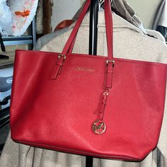 Beautiful Leather Red Tote Never Used ! Good To Carry A Lop Top Or Books In Great Conditions Michael Kors Red Bag For Everyday Use, Red Michael Kors Bag For Errands, Michael Kors Red Shoulder Bag For Shopping, Michael Kors Red Shoulder Bag For Daily Use, Red Michael Kors Shoulder Bag For Daily Use, Red Michael Kors Shoulder Bag For Shopping, Red Michael Kors Shoulder Bag, Red Tote, Michael Kors Bag