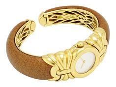 Round white dial with gold baton hands, 18k gold case between fluted gold shoulders, to the 18k gold spring bracelet with interchangeable bands. Includes eight interchangeable leather bands. Signed Bulgari. There is slight wear to the leather bands. Includes manufacturer's box. Elegant Gold Watches For Formal Occasions, Designer Gold Watch With Bracelet Strap, Luxury Antique Gold Watch Bands, Elegant Gold Watches As Fashion Accessory, Designer Gold Leather Watch Accessories, Luxury Gold Watch Accessories With Rotating Bezel, Elegant Yellow Gold Leather Watch Accessories, Designer Gold Watches With Leather Strap, Luxury Gold Watch Bands With Leather Strap