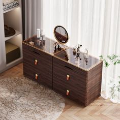 a wooden dresser sitting in front of a window with a mirror on top of it