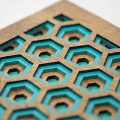 a close up view of some blue and brown hexagonals