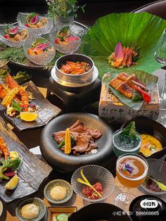 a table topped with lots of different types of food