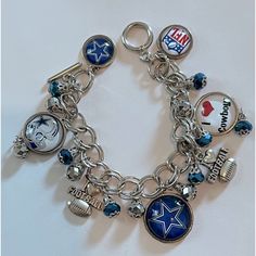 a close up of a bracelet with charms on it