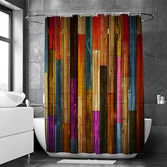 a colorful shower curtain in a bathroom