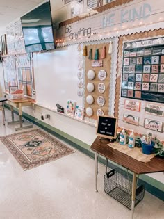 an empty cafeteria with lots of plates on the wall and decorations hanging from the ceiling