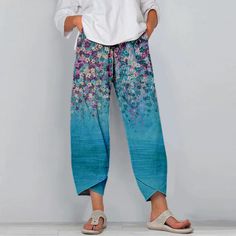 Stay chic and comfortable this Eid with our Hipster Small Floral Sportswear Pants! 🌸✨ Perfect for workouts or casual outings, these pants offer both style and functionality. Embrace floral elegance and elevate your active wardrobe this festive season. Shop now and step into effortless sophistication! #EidFashion #SportswearPants #FloralPrint #EidCelebrations #Fashionista #EidVibes #ShopNow #MyComfyPant #EidShopping #FashionForward #EidEssentials #ComfortAndStyle #CelebrationReady Casual Cotton Bottoms For Vacation, Relaxed Baggy Harem Pants For Spring, Leisure Cotton Pants With Pull-on Style, Comfortable Cotton Bottoms For Vacation, Spring Relaxed Ankle-length Harem Pants, Relaxed Spring Harem Pants, Ankle-length, Relaxed Spring Ankle-length Harem Pants, Relaxed Ankle-length Harem Pants For Spring, Spring Comfortable Loose-fit Harem Pants